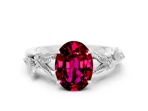 White gold Oval Cut Garnet Solitaire Ring with Leaf Motif Band and Four-Prong Setting
