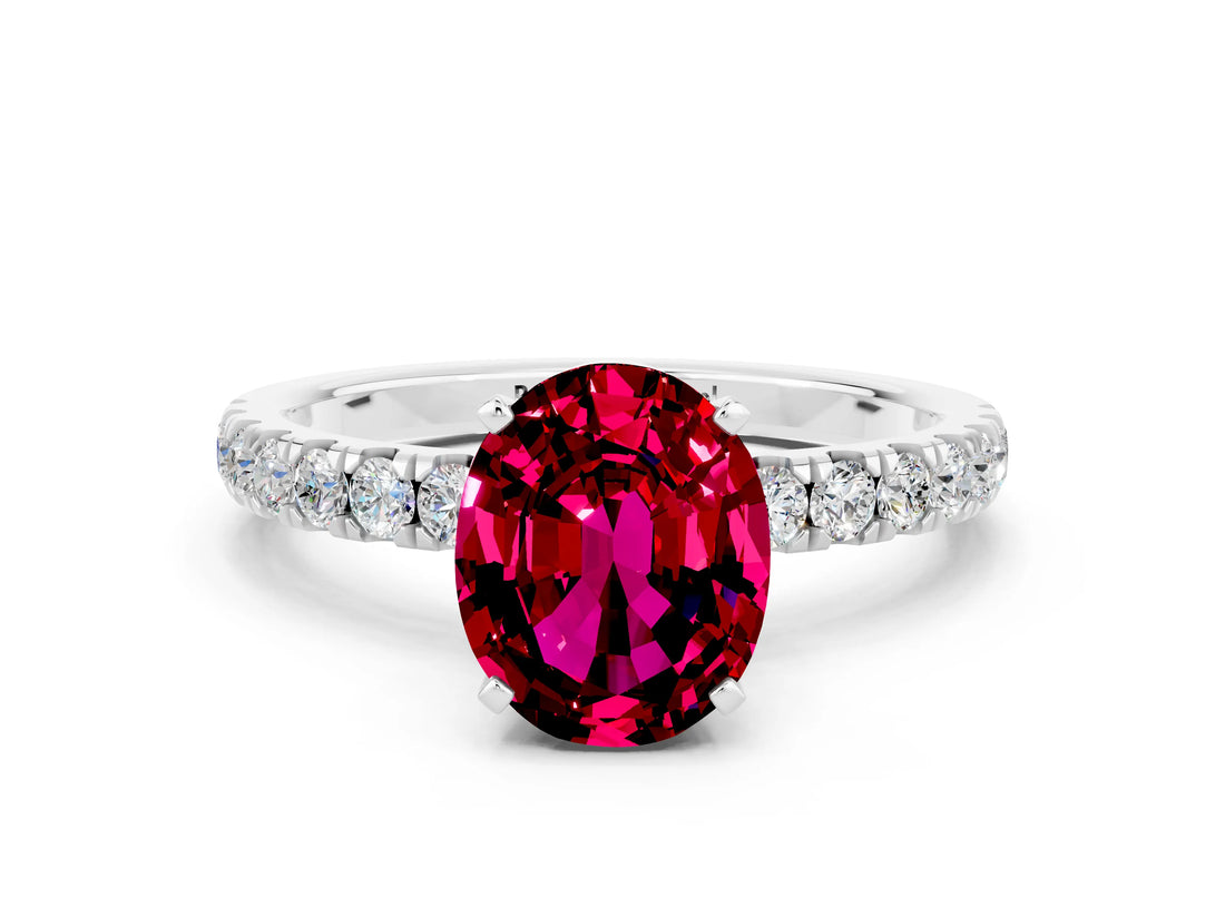 White gold Oval Cut Garnet Solitaire Ring with Pavé Accents and Four-Prong Setting