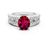 White gold Oval Cut Garnet Solitaire Ring with Pavé and Channel Set Band