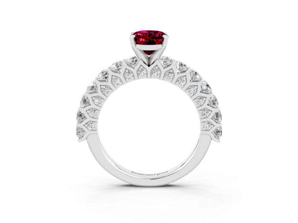 White gold Oval Cut Garnet Solitaire Ring with Shared Prong Pavé Band and Four-Prong Setting