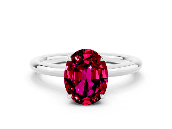 Silver Oval Cut Garnet Solitaire Ring with Thin Band and Four-Prong Setting