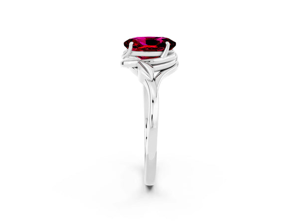 Silver Oval Cut Garnet Solitaire Ring with Twist Band and Four-Prong Setting