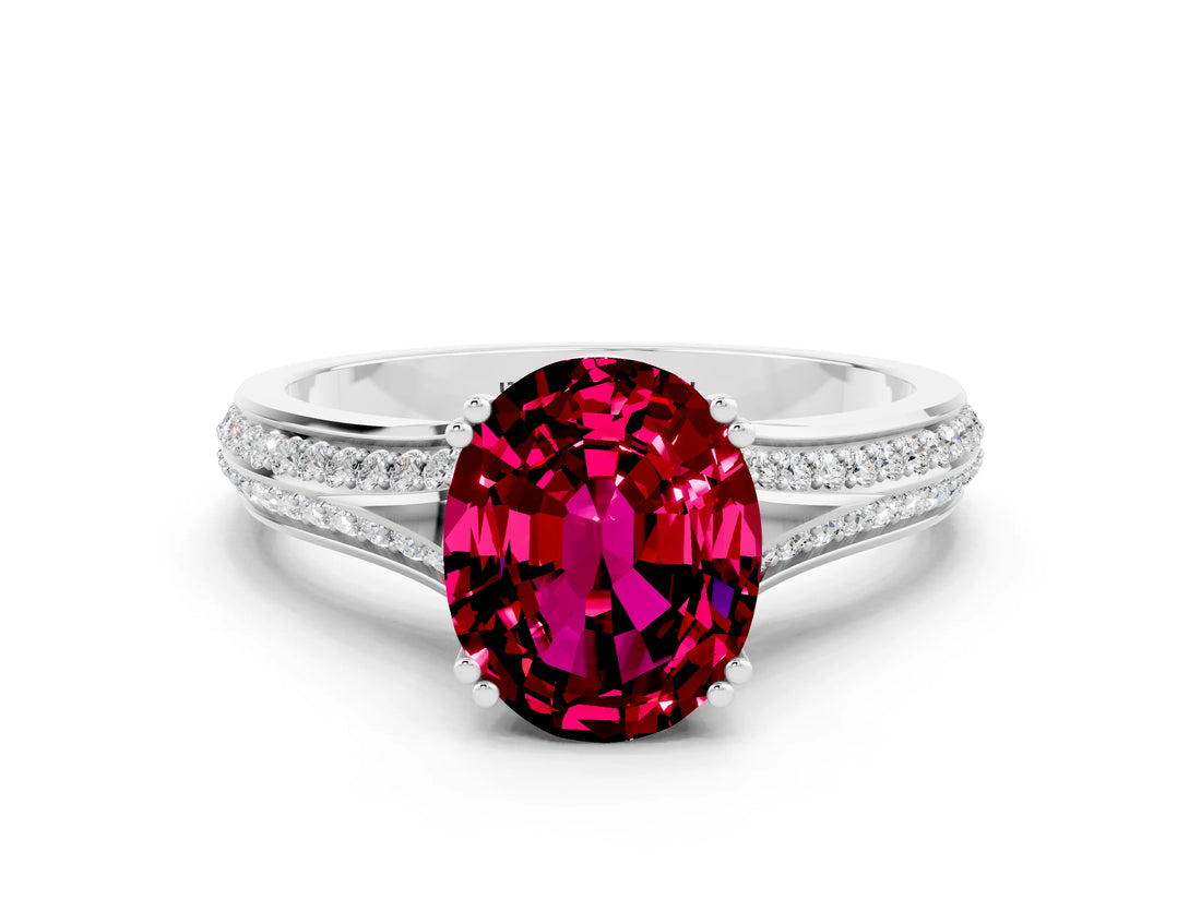 White gold Oval Cut Garnet Split Shank Engagement Ring with Pavé Band
