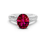 White gold Oval Cut Garnet Split Shank Engagement Ring with Pavé Band
