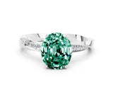 White gold Oval Cut Green Sapphire Engagement Ring with Side Stone Accents and Four-Prong Setting_36
