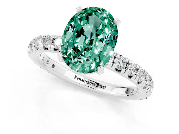 Platinum Oval Cut Green Sapphire Pavé Solitaire Ring with Round Band and Prong Setting