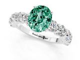 White gold Oval Cut Green Sapphire Prong Setting with Side Stones on a Pave Band_1
