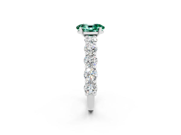 White gold Oval Cut Green Sapphire Prong Setting with Side Stones on a Pave Band