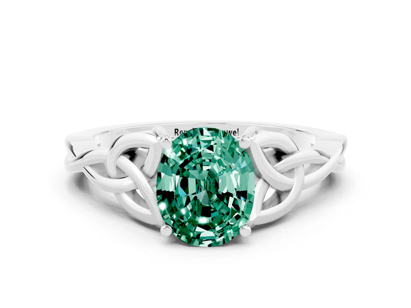 Silver Oval Cut Green Sapphire Solitaire Celtic Knot Ring with Four-Prong Setting