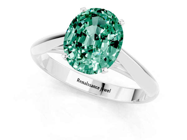 White gold Oval Cut Green Sapphire Solitaire Engagement Ring with Cathedral Setting and Four-Prong Mount