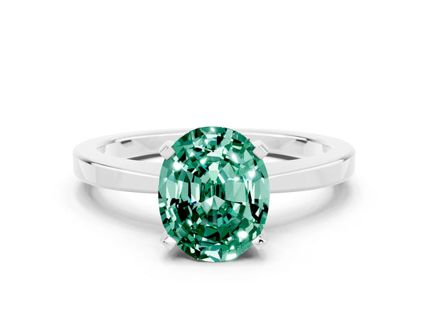 Platinum Oval Cut Green Sapphire Solitaire Engagement Ring with Classic Band and Four-Prong Setting