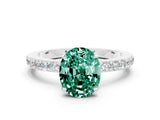 White gold Oval Cut Green Sapphire Solitaire Engagement Ring with Pavé Band and Four-Prong Setting