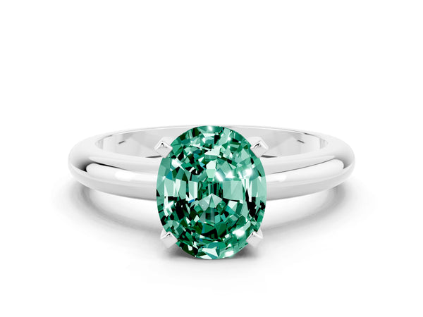 Platinum Oval Cut Green Sapphire Solitaire Engagement Ring with Round Band and Four-Prong Setting