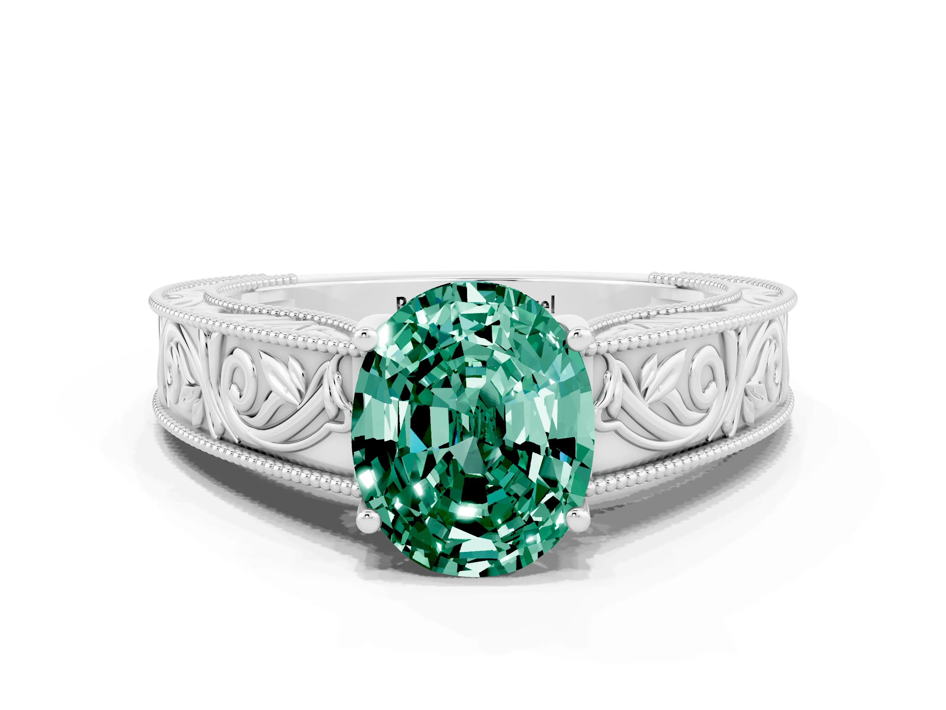 White gold Oval Cut Green Sapphire Solitaire Ring with Engraved Band and Four-Prong Setting