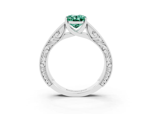 Platinum Oval Cut Green Sapphire Solitaire Ring with Engraved Band and Four-Prong Setting