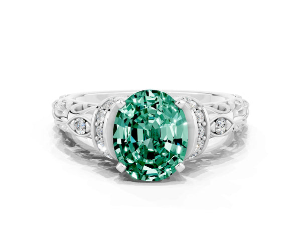 Silver Oval Cut Green Sapphire Solitaire Ring with Filigree Band and Four-Prong Setting