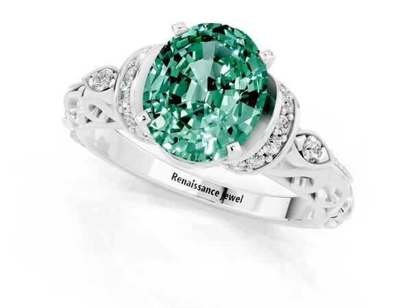 Platinum Oval Cut Green Sapphire Solitaire Ring with Filigree Band and Four-Prong Setting
