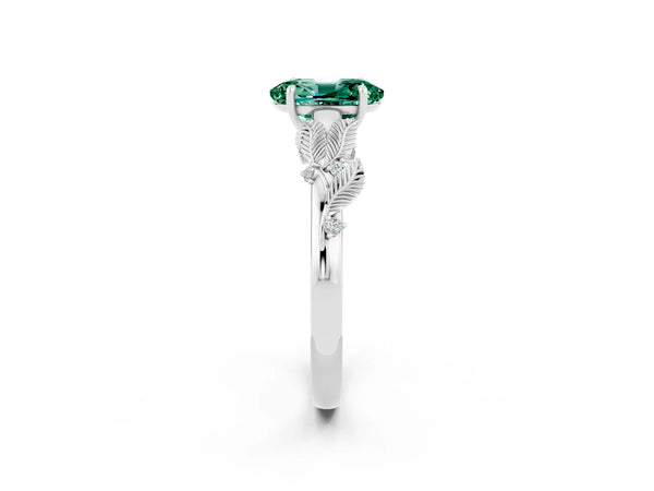 Silver Oval Cut Green Sapphire Solitaire Ring with Leaf Motif Band and Four-Prong Setting