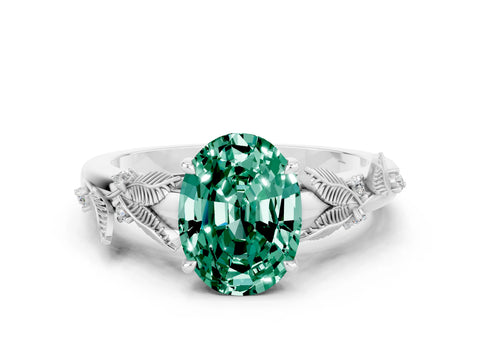 White gold Oval Cut Green Sapphire Solitaire Ring with Leaf Motif Band and Four-Prong Setting
