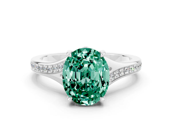 Silver Oval Cut Green Sapphire Solitaire Ring with Pavé Band and Prong Setting