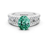 White gold Oval Cut Green Sapphire Solitaire Ring with Pavé and Channel Set Band