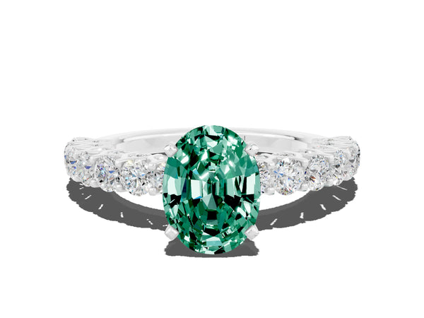 Platinum Oval Cut Green Sapphire Solitaire Ring with Shared Prong Pavé Band and Four-Prong Setting