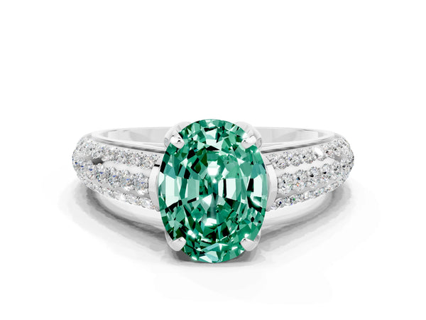 Platinum Oval Cut Green Sapphire Solitaire Ring with Three-Row Pavé Band and Four-Prong Setting