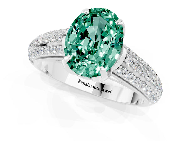 Platinum Oval Cut Green Sapphire Solitaire Ring with Three-Row Pavé Band and Four-Prong Setting