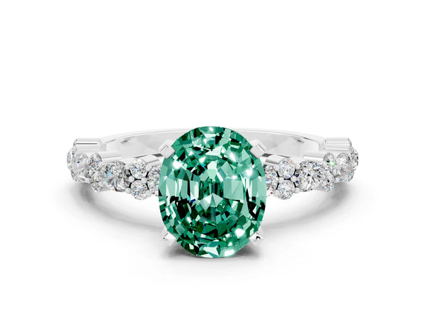 Platinum Oval Cut Green Sapphire Side Stone Solitaire Ring with Round  and Four-Prong Setting