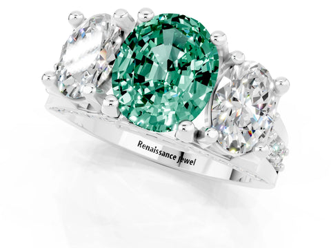 White gold Oval Cut Green Sapphire Three-Stone Ring with Channel Set Band and Four-Prong Setting_1