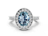 White gold Oval Cut Halo Diamond Engagement Ring with Milgrain Pave Band and Four-Prong Setting