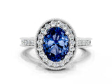 White gold Oval Cut Halo Diamond Engagement Ring with Milgrain Pave Band and Four-Prong Setting