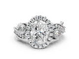 White gold Oval Cut Halo Diamond Ring with Milgrain and Bezel Accents on a Split Shank Band_16