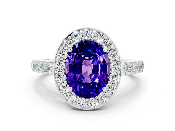 Platinum Oval Cut Tanzanite Halo Ring with Round Pavé Split Shank and Prong Setting
