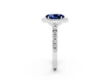 White gold Oval Cut Halo Diamond Ring with Pavé Band and Three-Prong Setting_2