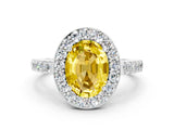 White gold Oval Cut Halo Diamond Ring with Pavé Band and Three-Prong Setting
