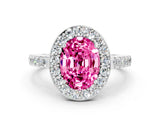 White gold Oval Cut Halo Diamond Ring with Pavé Band and Three-Prong Setting