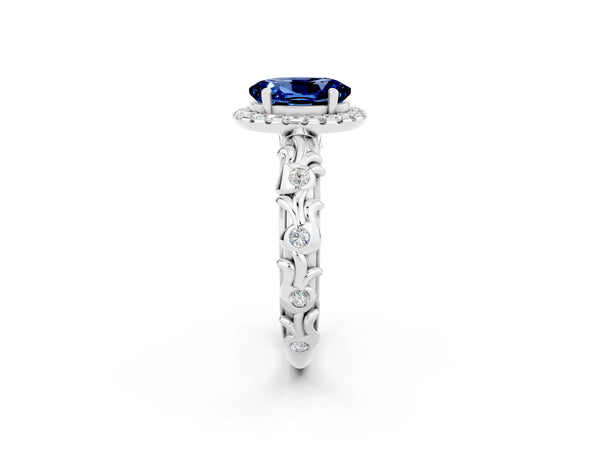 Platinum Oval Cut Blue Sapphire Halo Ring with Filigree Band and Prong Setting