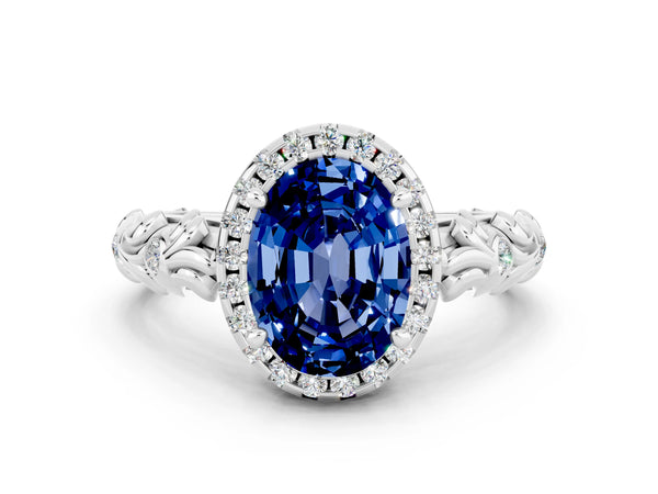 Platinum Oval Cut Blue Sapphire Halo Ring with Filigree Band and Prong Setting