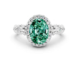 White gold Oval Cut Halo Diamond Solitaire with Filigree Band and Four-Prong Setting