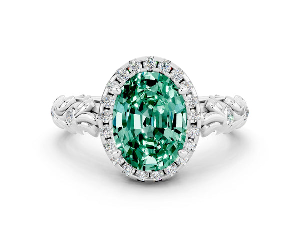 Platinum Oval Cut Green Sapphire Halo Ring with Filigree Band and Prong Setting