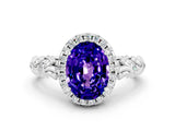 White gold Oval Cut Halo Diamond Solitaire with Filigree Band and Four-Prong Setting