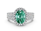 White gold Oval Cut Halo Pavé Diamond Engagement Ring with Split Shank and Four-Prong Setting