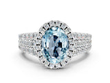 White gold Oval Cut Halo Pavé Diamond Engagement Ring with Split Shank and Four-Prong Setting