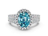 White gold Oval Cut Halo Pavé Diamond Engagement Ring with Split Shank and Four-Prong Setting