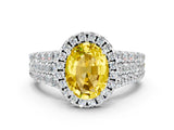 White gold Oval Cut Halo Pavé Diamond Engagement Ring with Split Shank and Four-Prong Setting