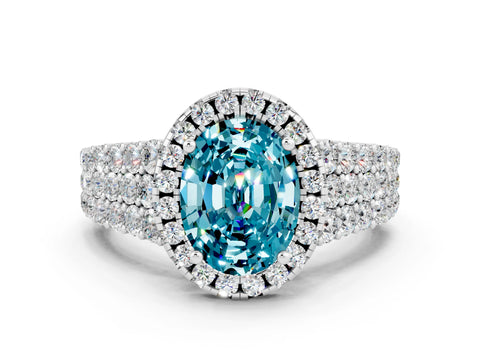 White gold Oval Cut Halo Pavé Diamond Engagement Ring with Split Shank and Four-Prong Setting