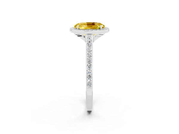 Platinum Oval Cut Yellow Sapphire Halo Engagement Ring with Round Pavé Shoulders and Prong Setting