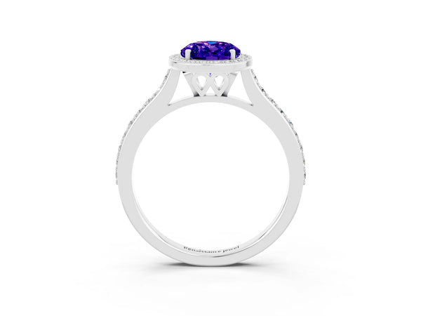 Platinum Oval Cut Tanzanite Halo Engagement Ring with Round Pavé Shoulders and Prong Setting