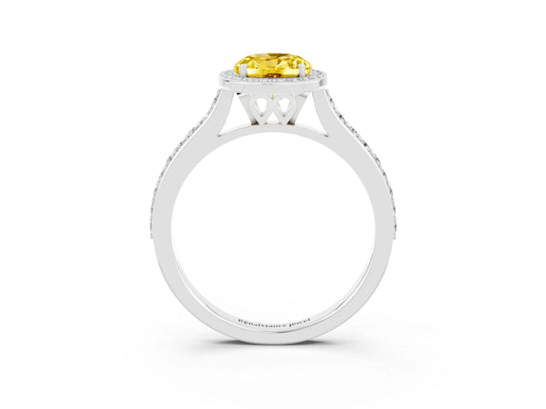 Silver Oval Cut Yellow Sapphire Halo Engagement Ring with Round Pavé Shoulders and Prong Setting